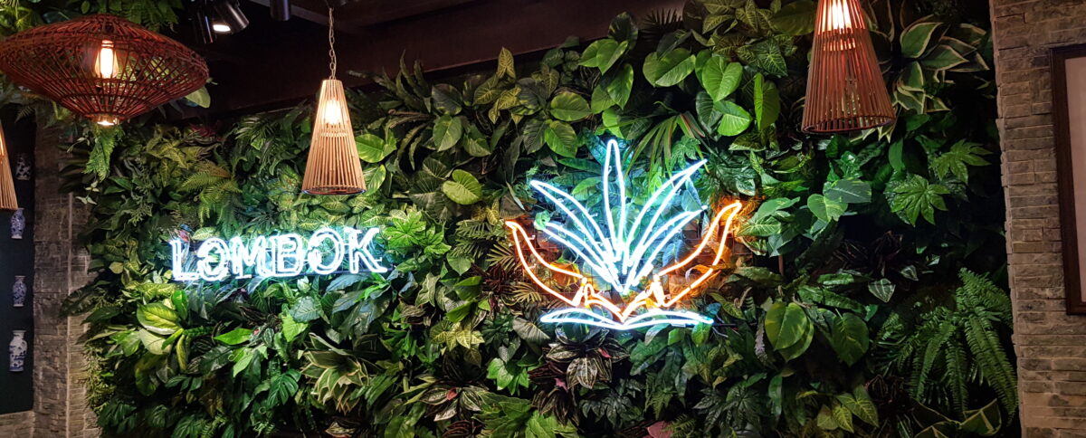 Touch Design neon sign plant wall feature